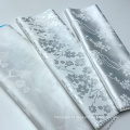 Poliéster Spandex tecido branco floral de cetim de jacquard